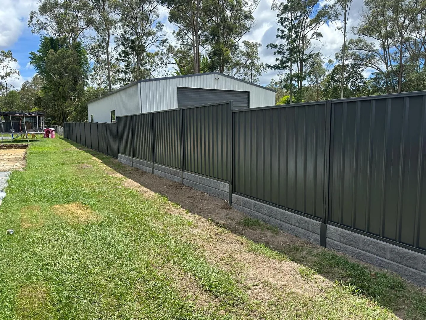 Colorbond fence and gate with new turf