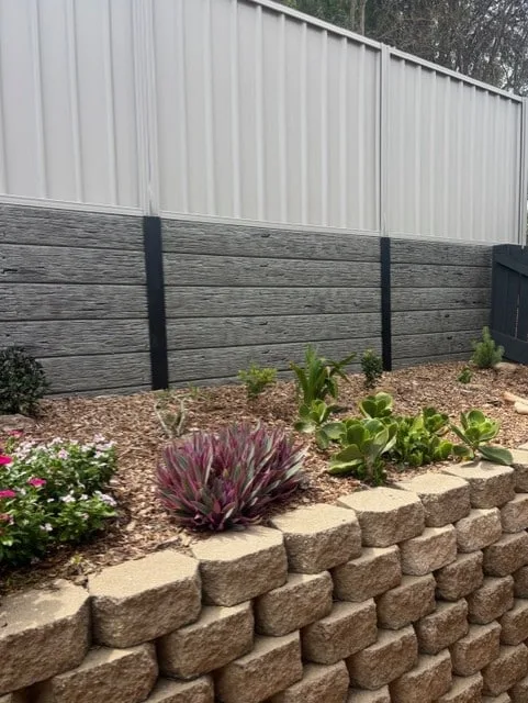 Landscaped front yard with paved steps and turf