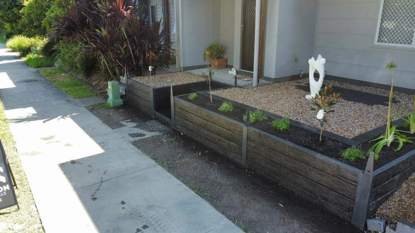 Aerial view of raised garden beds and paving