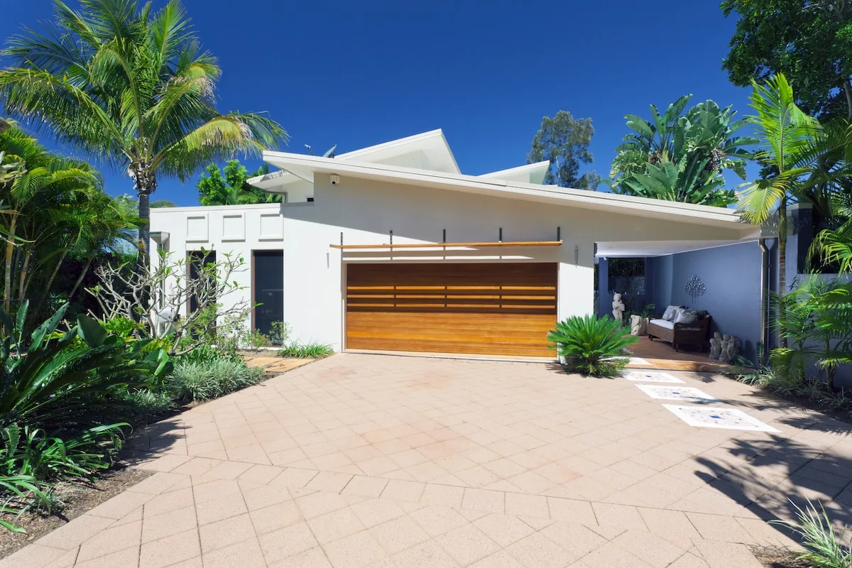 Front yard landscaping with paving and established planting